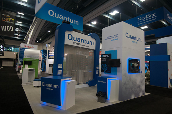 A MUXWilliams trade show booth build with environmental wraps and digital signage.